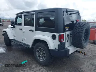 2016 Jeep Wrangler Unlimited Sahara with VIN 1C4BJWEG8GL129577, listed as a IAAI auction lot 42184373 with 185,761 mi miles and . Bid and sale history available at DreamBid. Image 3.