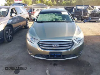 2013 Ford Taurus SEL with VIN 1FAHP2E91DG235771, listed as a IAAI auction lot 40210537 with 179,780 mi miles and . Bid and sale history available at carsss.com. Image 13.