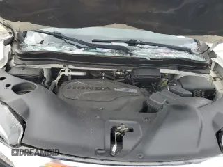 2017 Honda Pilot Touring z VIN 5FNYF6H92HB067140, wystawiony jako Copart lot #55757925 z przebiegiem 132 425 mil mil oraz Szkoda całkowita • Salvage title. Historia ofert i sprzedaży dostępna na DreamBid. Obrazek 12.