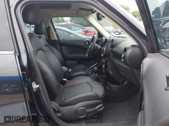 2014 MINI Countryman S z VIN WMWZC3C58EWT01074, wystawiony jako IAAI lot #42238095 z przebiegiem 83 252 mil mil oraz . Historia ofert i sprzedaży dostępna na DreamBid. Obrazek 5.