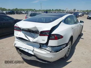2017 Tesla Model S 100D with VIN 5YJSA1E20HF232570, listed as a IAAI auction lot 42037409 with 68,957 mi miles and . Bid and sale history available at DreamBid. Image 4.