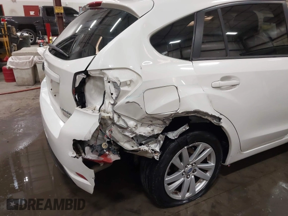 2015 Subaru Impreza Premium with VIN JF1GPAC64FH272292, listed as a IAAI auction lot 42189917 with 125,386 mi miles and . Bid and sale history available at DreamBid. Image 6.