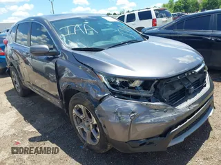 2019 Honda CR-V EX z VIN 7FARW1H58KE027824, wystawiony jako IAAI lot #42381140 z przebiegiem 96 241 mil mil oraz . Historia ofert i sprzedaży dostępna na DreamBid. Obrazek 1.