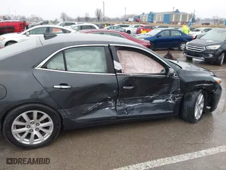 2015 Chevrolet Malibu LTZ with VIN 1G11F5SL4FF241887, listed as a IAAI auction lot 41419269 with 161,099 mi miles. Bid and sale history available at carsss.com. Image 6.