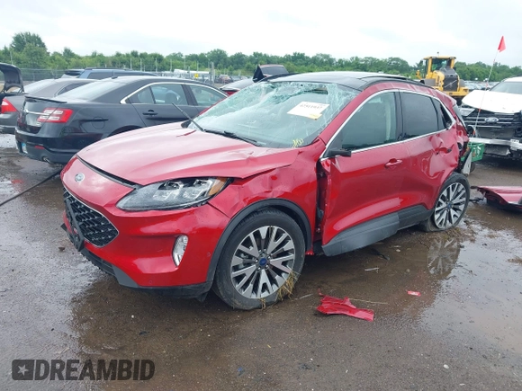 2020 Ford Escape Titanium with VIN 1FMCU9J9XLUA99423, listed as a IAAI auction lot 42511937 with 17,849 mi miles and . Bid and sale history available at DreamBid. Image 2.