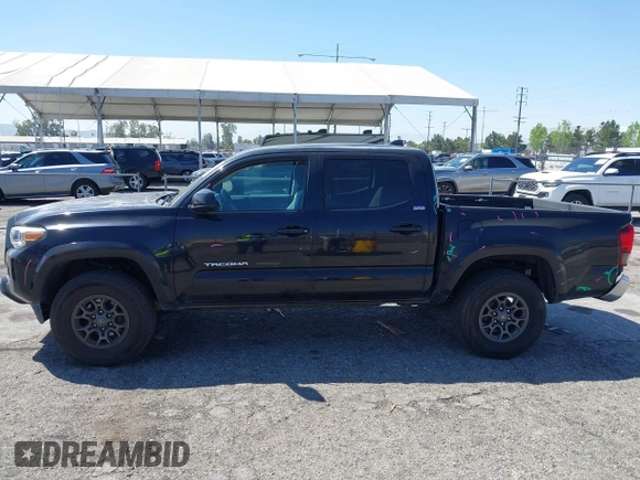 2018 Toyota Tacoma SR5 with VIN 3TMAZ5CN1JM061127, listed as a IAAI auction lot 42012247 with 119,381 mi miles and . Bid and sale history available at DreamBid. Image 14.
