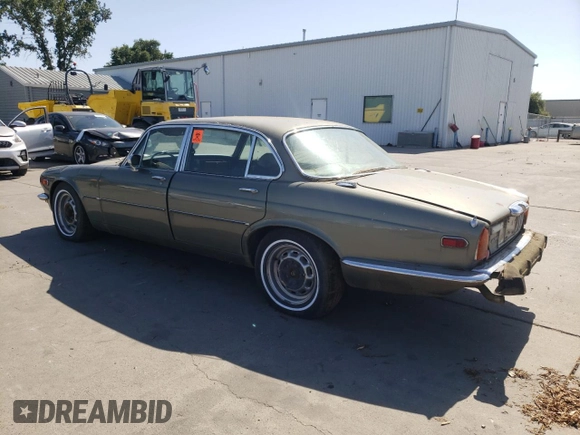 1974 Jaguar XJ with VIN UE2T52398, listed as a Copart auction lot 59589415 with 93,740 mi miles and Clean title. Bid and sale history available at DreamBid. Image 2.