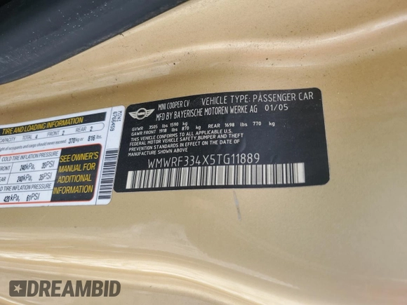 2005 MINI Convertible with VIN WMWRF334X5TG11889, listed as a Copart auction lot 55567995 with 169,717 mi miles and Salvage title. Bid and sale history available at DreamBid. Image 12.