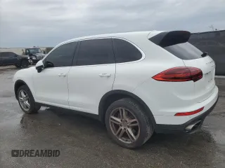 2016 Porsche Cayenne with VIN WP1AA2A28GKA10883, listed as a Copart auction lot 46428285 with 113,976 mi miles and Salvage Title. Bid and sale history available at carsss.com. Image 2.