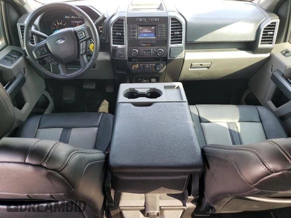 2015 Ford F-150 XLT with VIN 1FTEW1EP0FKF00544, listed as a Copart auction lot 62571615 with 233,318 mi miles and Salvage title. Bid and sale history available at DreamBid. Image 8.