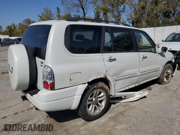 2005 Suzuki XL7 LX z VIN JS3TX92VX54100730, wystawiony jako Copart lot #74913534 z przebiegiem 91 838 mil mil oraz Szkoda całkowita • Salvage title. Historia ofert i sprzedaży dostępna na DreamBid. Obrazek 3.