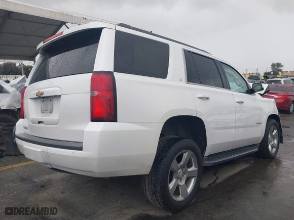 2018 Chevrolet Tahoe LT with VIN 1GNSKBKC7JR351112, listed as a IAAI auction lot 41732631 with 103,771 mi miles. Bid and sale history available at carsss.com. Image 4.