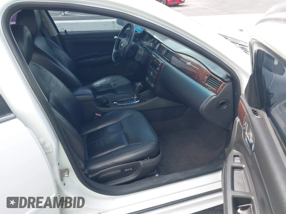 2013 Chevrolet Impala LTZ with VIN 2G1WC5E38D1258965, listed as a IAAI auction lot 42001465 with 139,929 mi miles and . Bid and sale history available at DreamBid. Image 5.