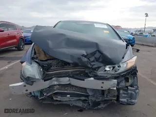 2015 Honda Civic Coupe LX with VIN 2HGFG3B55FH517607, listed as a IAAI auction lot 41569081 with 106,277 mi miles. Bid and sale history available at carsss.com. Image 13.