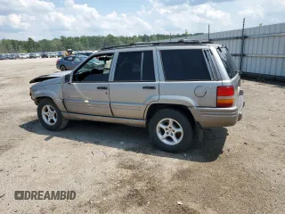1998 Jeep Grand Cherokee Limited with VIN 1J4GZ88Z9WC148445, listed as a Copart auction lot 65961744 with 180,067 mi miles and Clean Title. Bid and sale history available at carsss.com. Image 2.