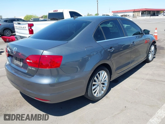 2011 Volkswagen Jetta SEL with VIN 3VWLZ7AJ4BM023877, listed as a IAAI auction lot 42054594 with 103,680 mi miles and . Bid and sale history available at DreamBid. Image 4.