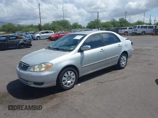 2004 Toyota Corolla CE with VIN 1NXBR32E14Z256828, listed as a IAAI auction lot 41937841 with 114,826 mi miles and . Bid and sale history available at DreamBid. Image 2.