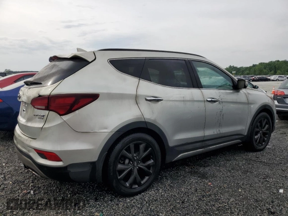 2018 Hyundai Santa Fe Ultimate с VIN 5XYZW4LA5JG545656, выставлен на аукционе Copart как лот 57390895 с пробегом 82 988 миль миль и На запчасти • Non repairable. История ставок и продаж доступна на DreamBid. Изображение 3.