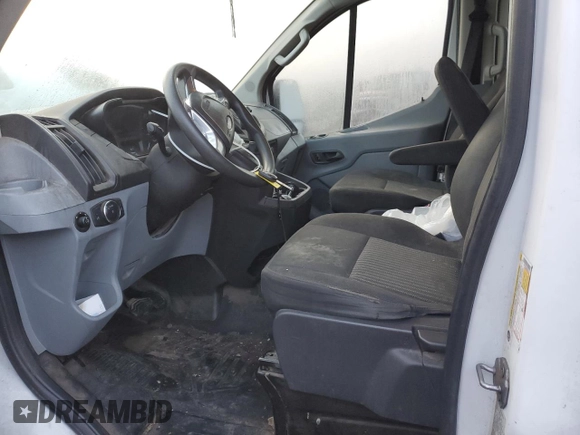 2019 Ford Transit with VIN 1FTYR1ZM6KKB01524, listed as a Copart auction lot 87309434 with 74,696 mi miles and Salvage Title. Bid and sale history available at DreamBid. Image 7.