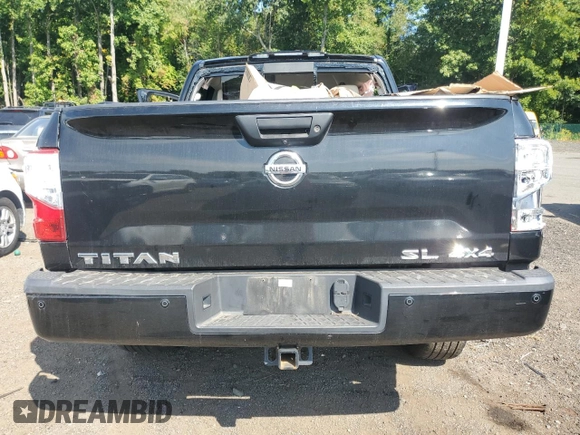 2017 Nissan Titan SV z VIN 1N6AA1E51HN571617, wystawiony jako Copart lot #71640544 z przebiegiem 89 088 mil mil oraz Szkoda całkowita • Salvage title. Historia ofert i sprzedaży dostępna na DreamBid. Obrazek 6.