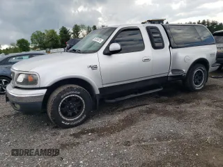 2000 Ford F-150 XL with VIN 2FTRX08L2YCA22507, listed as a Copart auction lot 55390075 with 197,785 mi miles and Salvage title. Bid and sale history available at DreamBid. Image 1.
