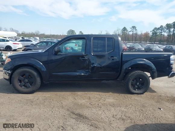 2009 Nissan Frontier SE with VIN 1N6AD07U89C405310, listed as a IAAI auction lot 41920771 with 271,894 mi miles. Bid and sale history available at carsss.com. Image 14.