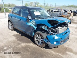 2012 MINI Countryman S z VIN WMWZC5C5XCWM13027, wystawiony jako IAAI lot #42275978 z przebiegiem 133 231 mil mil oraz . Historia ofert i sprzedaży dostępna na DreamBid. Obrazek 1.