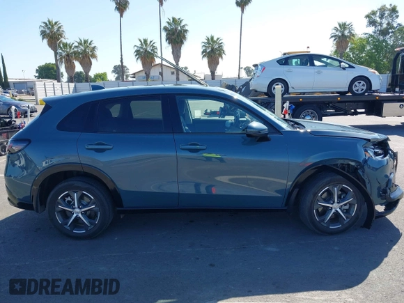 2023 Honda HR-V EX-L with VIN 3CZRZ1H77PM702998, listed as a IAAI auction lot 42267423 with 25,438 mi miles and . Bid and sale history available at DreamBid. Image 12.