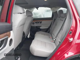 2021 Honda CR-V Touring with VIN 2HKRW2H9XMH663315, listed as a IAAI auction lot 42188893 with 26,203 mi miles and . Bid and sale history available at DreamBid. Image 8.
