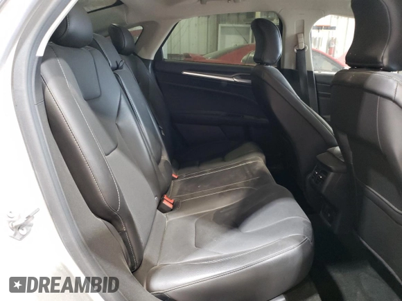 2016 Ford Fusion Titanium Hybrid with VIN 3FA6P0RUXGR355351, listed as a Copart auction lot 56516025 with 117,964 mi miles and Salvage title. Bid and sale history available at DreamBid. Image 10.