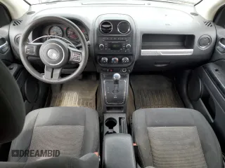 2016 Jeep Compass Sport with VIN 1C4NJDBB3GD520141, listed as a Copart auction lot 56902885 with 147,154 mi miles and Salvage title. Bid and sale history available at DreamBid. Image 8.