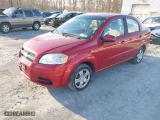 2011 Chevrolet Aveo LT w/1LT with VIN KL1TD5DE9BB185331, listed as a IAAI auction lot 41580030 with 119,501 mi miles. Bid and sale history available at carsss.com. Image 2.