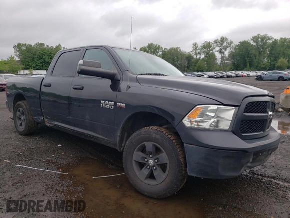 2016 Ram 1500 Tradesman with VIN 1C6RR7STXGS229806, listed as a Copart auction lot 61156965 with 102,296 mi miles and Salvage title. Bid and sale history available at DreamBid. Image 4.