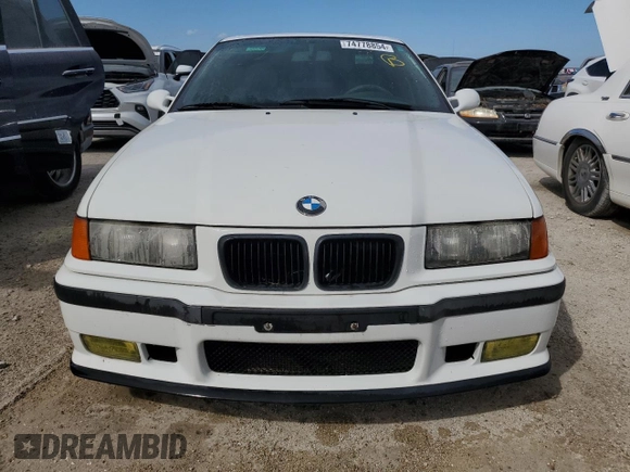1997 BMW M3 with VIN WBSCD9324VEE06968, listed as a Copart auction lot 74778854 with Not provided miles and Salvage title. Bid and sale history available at DreamBid. Image 5.
