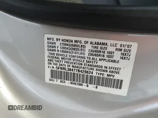 2007 Honda Odyssey EX with VIN 5FNRL38477B429624, listed as a Copart auction lot 53961825 with 144,957 mi miles and Salvage Title. Bid and sale history available at DreamBid. Image 13.