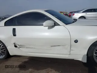 2004 Nissan 350Z Touring with VIN JN1AZ34D14M102966, listed as a IAAI auction lot 41921270 with 182,633 mi miles. Bid and sale history available at carsss.com. Image 14.