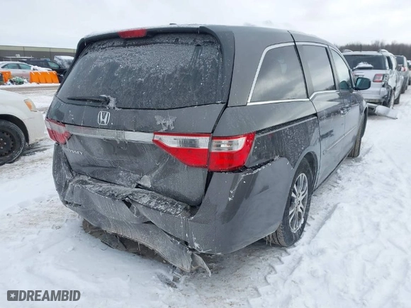 2013 Honda Odyssey EX-L with VIN 5FNRL5H65DB055040, listed as a IAAI auction lot 41615182 with 246,225 mi miles. Bid and sale history available at carsss.com. Image 4.