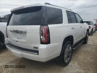 2019 GMC Yukon Denali with VIN 1GKS1CKJ0KR395653, listed as a Copart auction lot 79501764 with 0 mi miles and Salvage Title. Bid and sale history available at carsss.com. Image 3.
