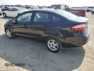 2015 Ford Fiesta SE z VIN 3FADP4BJXFM146122, wystawiony jako Copart lot #59998625 z przebiegiem 114 191 mil mil oraz Czysty tytuł • Clean title. Historia ofert i sprzedaży dostępna na DreamBid. Obrazek 2.