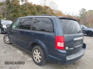 2008 Chrysler Town & Country LX with VIN 2A8HR44H28R114978, listed as a IAAI auction lot 41860775 with 179,828 mi miles. Bid and sale history available at carsss.com. Image 3.