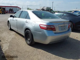 2007 Toyota Camry CE with VIN JTNBE46K773058525, listed as a IAAI auction lot 41927357 with 245,984 mi miles. Bid and sale history available at carsss.com. Image 3.