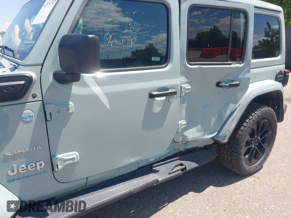 2023 Jeep Wrangler Sahara with VIN 1C4JJXP68PW627007, listed as a IAAI auction lot 42474745 with 57,912 mi miles and . Bid and sale history available at DreamBid. Image 6.
