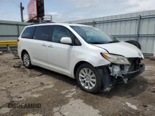 2011 Toyota Sienna XLE AAS with VIN 5TDYK3DC4BS045123, listed as a Copart auction lot 61001785 with 149,260 mi miles and Salvage title. Bid and sale history available at DreamBid. Image 4.
