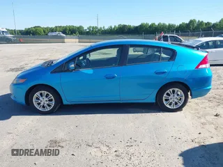 2010 Honda Insight EX with VIN JHMZE2H74AS013148, listed as a IAAI auction lot 42194894 with 114,885 mi miles and . Bid and sale history available at DreamBid. Image 13.