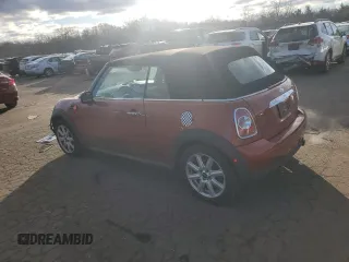 2012 MINI Convertible z VIN WMWZN3C57CT265368, wystawiony jako Copart lot #87100414 z przebiegiem 124 102 mil mil oraz Szkoda całkowita • Salvage title. Historia ofert i sprzedaży dostępna na DreamBid. Obrazek 2.