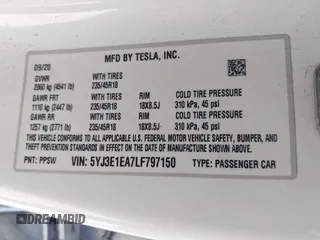 2020 Tesla Model 3 Standard Range Plus with VIN 5YJ3E1EA7LF797150, listed as a IAAI auction lot 41869088 with 75,708 mi miles and . Bid and sale history available at carsss.com. Image 9.
