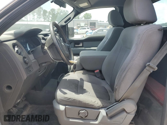 2014 Ford F-150 XL with VIN 1FTNF1CF2EKD21155, listed as a Copart auction lot 54897075 with 156,681 mi miles and Salvage title. Bid and sale history available at DreamBid. Image 7.