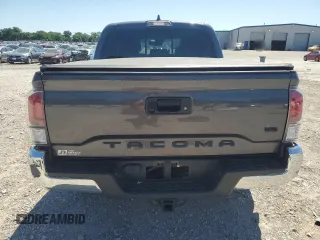2023 Toyota Tacoma SR with VIN 3TYCZ5AN9PT131515, listed as a Copart auction lot 57900865 with Not provided miles and Salvage title. Bid and sale history available at DreamBid. Image 6.