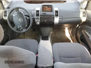 2008 Toyota Prius z VIN JTDKB20U687712274, wystawiony jako Copart lot #89291475 z przebiegiem 123 500 mil mil oraz Nie do naprawy • Non repairable. Historia ofert i sprzedaży dostępna na DreamBid. Obrazek 8.