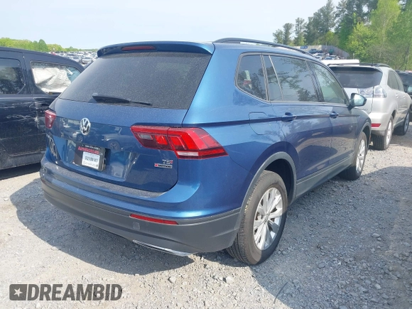 2018 Volkswagen Tiguan S with VIN 3VV0B7AXXJM018455, listed as a IAAI auction lot 41979115 with 92,104 mi miles and . Bid and sale history available at DreamBid. Image 4.